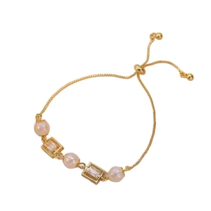 Adjustable gold bracelet with pink mermaid pearls and square cubic zirconia stones