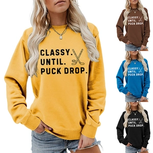 Detail showing various colors of the classy puck drop crewneck long sleeve sweatshirts