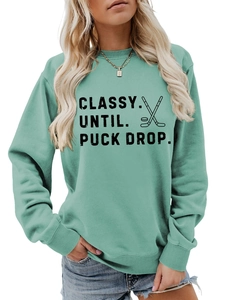 Detail of Classy Until Puck Drop letter print on mint green long sleeve sweatshirt