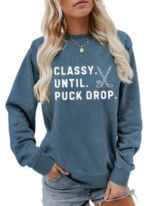 Detail of Classy Until Puck Drop hockey sweatshirt with ribbed collar and graphics