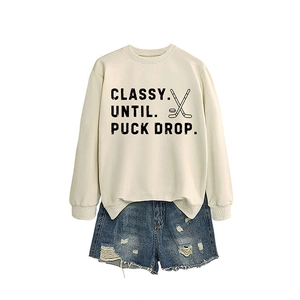 Classy Until Puck Drop sweatshirt paired with distressed blue denim shorts on white background