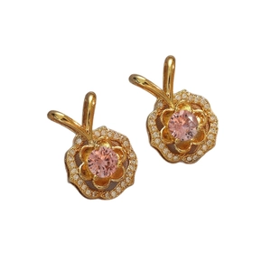 Elegant gold flower earrings with pink crystal center and sparkling white zircon pavé