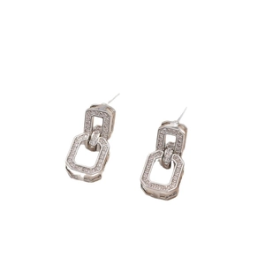 Boucles d'oreilles octogonales en argent entrelacées avec cristaux pavés étincelants