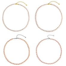Detail showing four assorted freshwater pearl bracelets in white, beige, pink and tan