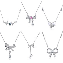 Detail of six S925 silver necklaces with butterfly, heart, and pearl pendant charms