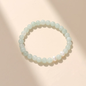 Bracelet en cristal vert avec perles baroques pour femmes au design minimaliste