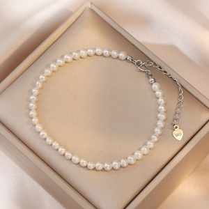 Elegant S925 sterling silver freshwater pearl bracelet with lobster clasp and heart charm