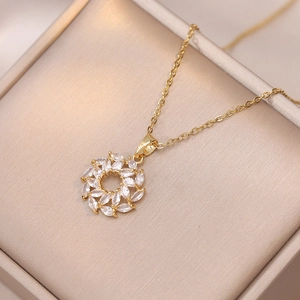 Elegant gold zircon flower wreath necklace displayed on premium champagne silk box