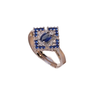 Adjustable gold ring with oval blue zircon and vintage square halo on white background