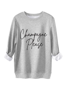 Dettaglio felpa grigio chiaro con stampa Champagne Please e fodera interna in pile