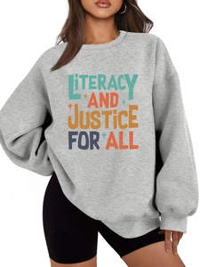 Detail of soft gray fleece sweatshirt with Literacy and Justice For All slogan print