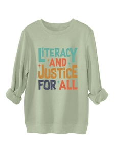 Detail of sage green sweatshirt sleeve cuff and cotton texture with letter print