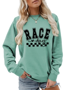 Detail of mint green sweatshirt with RACE day graphic print and ribbed collar texture