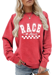 Close-up of vibrant red sweatshirt with RACE day text and checkered racing graphic detail