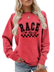 Close-up of red crewneck sweatshirt with black RACE day graphic and checkered flag print
