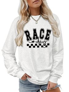 Detail of grey Race Day sweatshirt showing ribbed cuffs and racing flag graphic