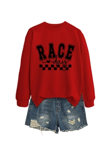 Close-up of red Race Day sweatshirt with checkered flag and distressed denim shorts