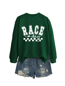 Detail of dark green crewneck sweatshirt with Race Day print and denim shorts
