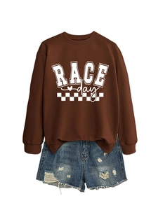 Brown Race Day sweatshirt with checkered flag print paired with frayed denim shorts