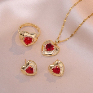 Vintage style gold-plated jewelry set with heart red stones and white zircon accents