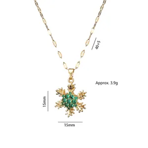 Collier flocon de neige rotatif avec zircon cubique vert émeraude doré
