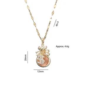 Collier sac d'argent doré avec pierre orange et pendentif signe dollar chic