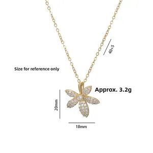 Detailed view of gold flower necklace with white pavé crystals and 40+5cm chain specs