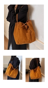 Close-up of caramel suede tote bag with matte texture and minimalist front pocket design