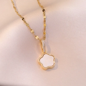Elegant gold titanium flower pendant necklace with white shell and zircon on champagne silk