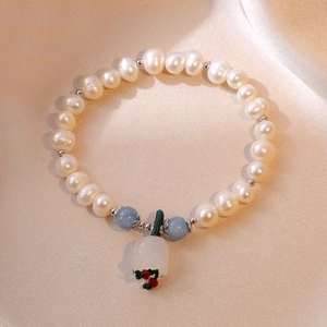 Elegant S925 silver freshwater pearl bracelet with lily of the valley flower charm
