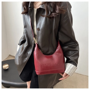 Chic burgundy half-moon shoulder bag in premium matte leather for women fashion