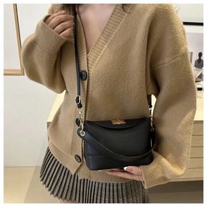 Classic black lychee pattern leather bucket bag with gold clasp and adjustable strap