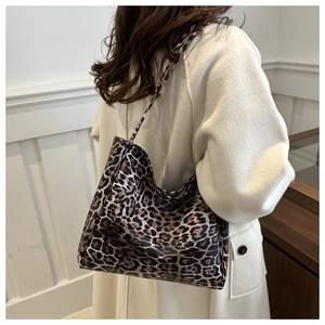 Large leopard print canvas shoulder bag for women with casual slouchy hobo tote design