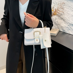 White crocodile pattern handbag with golden buckle and mini coin pouch on crossbody strap