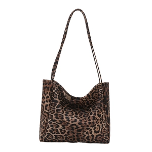 Large leopard print canvas tote bag with slim shoulder straps in a retro casual style