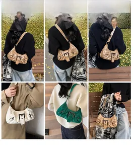 Chic biker hobo bag with adjustable strap shown in white, brown and green colors