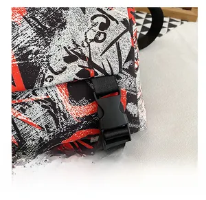 Detail of high-quality plastic buckle and graffiti print on nylon messenger bag