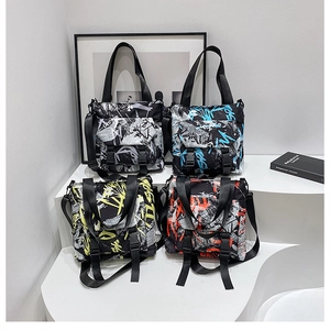 Graffiti print nylon tote bags in four colors with adjustable shoulder straps