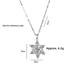 Rotating silver snowflake pendant necklace with cubic zirconia and pearl, 20mm charm size