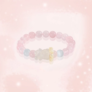 Rosa Kristallperlenarmband mit süßem weißem Bärenanhänger und blauen Akzentsteinen