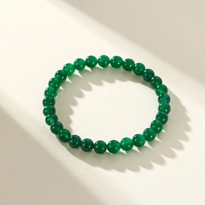 Natural green jasper beaded bracelet with smooth round beads and oily luster finish