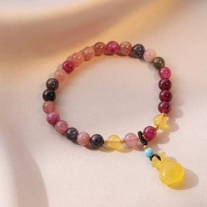 Colorful tourmaline crystal bead bracelet with a yellow lucky bag pendant on silk