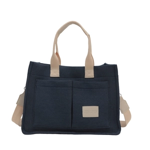 Large vintage navy canvas tote bag with multi-pockets and detachable shoulder strap