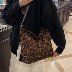 Leopard print faux suede tote bag for women featuring large capacity and retro shoulder strap