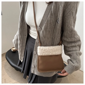 Chic brown leather and white faux shearling crossbody bag for women with slim strap