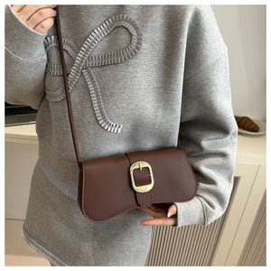 Chic dark brown faux leather rectangular crossbody bag with vintage gold metal buckle