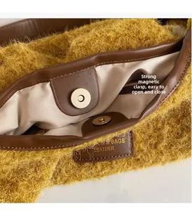 Detail view of strong magnetic closure and faux fur texture on yellow tote bag