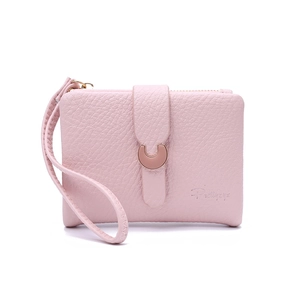 Close-up of pink lychee leather wallet with rose gold C-buckle and hand strap