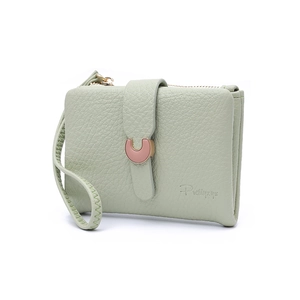 Close-up of light green lychee textured PU leather wallet with metallic snap closure