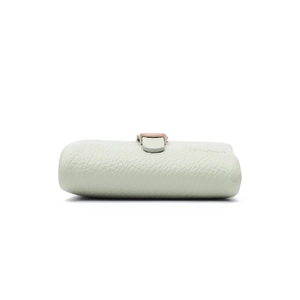 Detail view of mint green faux leather wallet with lychee texture and metal buckle